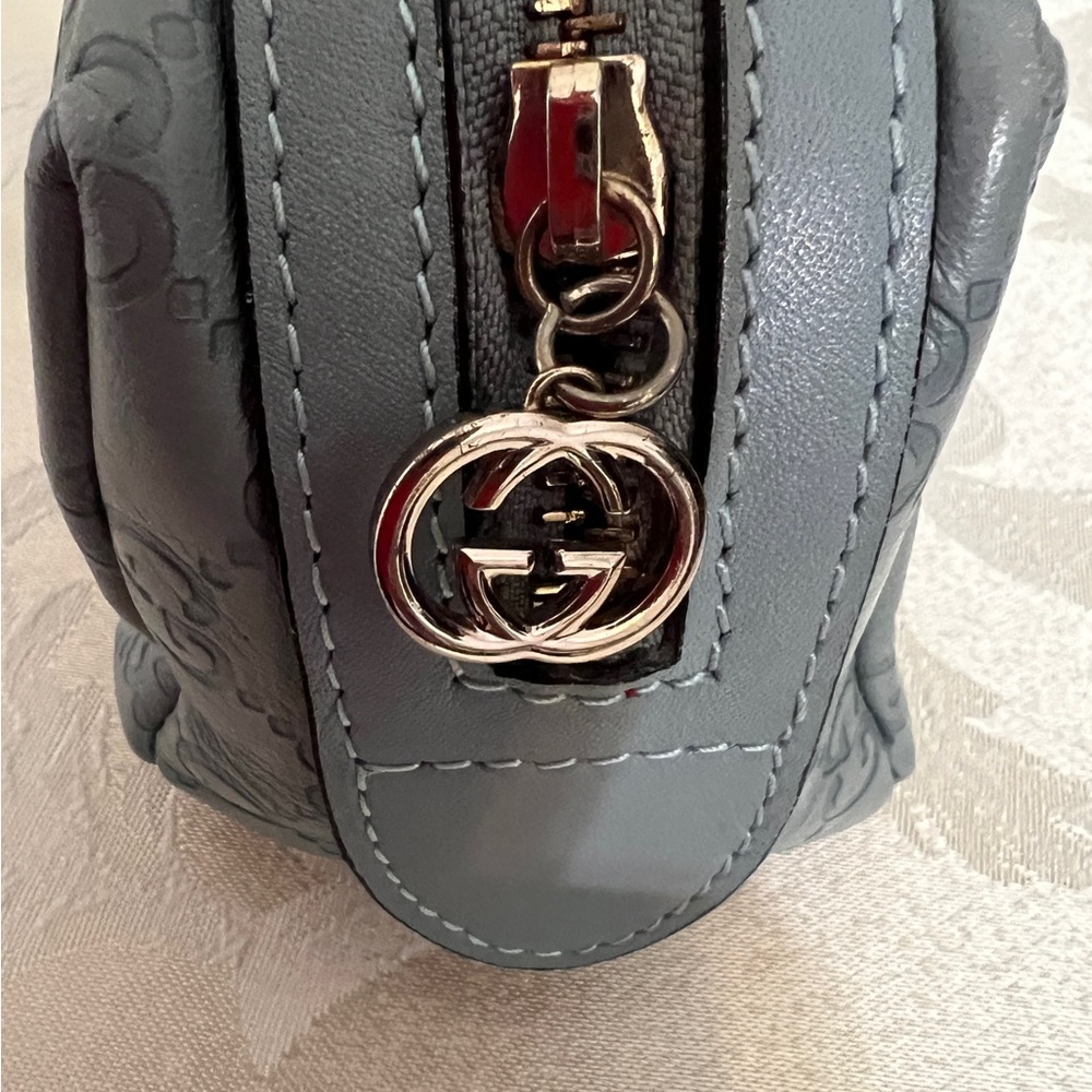 Gucci - authentic cosmetic pouch. Pairs beautifully with my Blue Coach handbag. - Picture 7 of 12